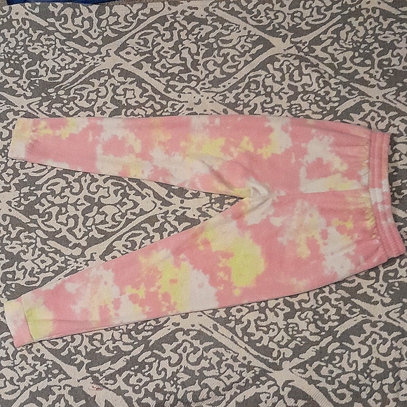 I am selling a medium size, yellow pink and white stitch and pine sweat pants - Picture 2 of 2